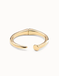 Brazalete con forma de clavo bañado en oro de 18k