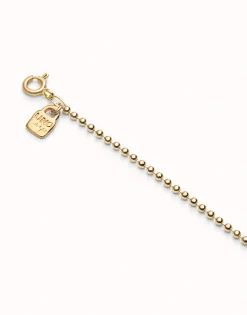 Cadena media con bolas bañada en oro 18k