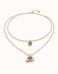 Colgante bañado en oro 18k con doble cadena y corazones con cristal negro