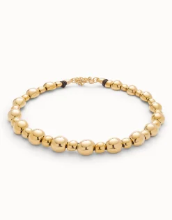 Colgante de bolas en dos tamaños bañado en oro 18k