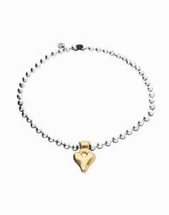 Collar de bolas bañada en plata con detalle de corazón en oro 18k