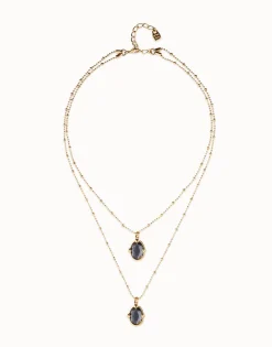 Collar doble bañado en oro 18k con dos cristales facetados ovalados negros