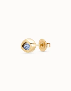 Piercing bañado en oro de 18k y un cristal azul