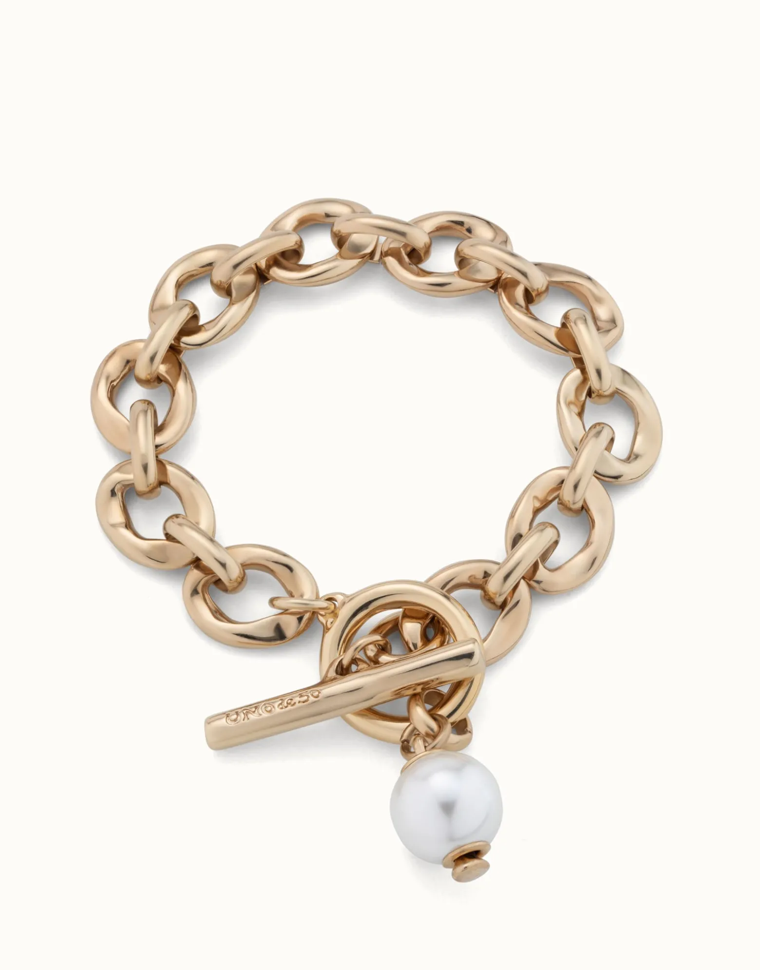 Pulsera bañada en oro 18k con eslabones y charm de perla