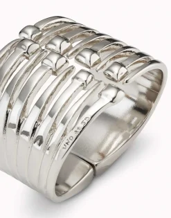 Pulsera bañada en plata de ley con múltiples cabezas de clavo