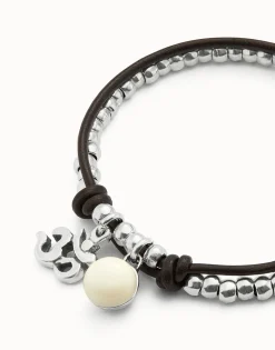 Pulsera bañadas en plata de ley con cuero y cristal de murano marfil
