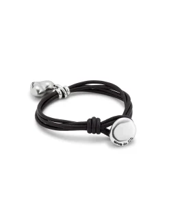 Pulsera con 4 tiras de cuero con cierre botón y charm de corazón bañado en plata de ley