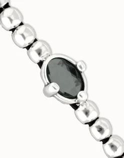 Pulsera de bolas bañada en plata con cristal facetado ovalado negro