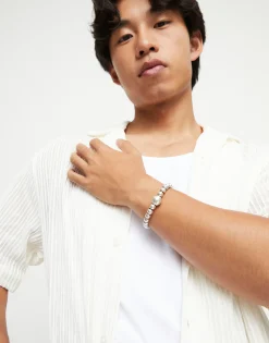 Pulsera de bolas bañadas en plata de ley y bola central de mayor tamaño