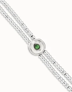 Pulsera de bolas doble bañada en plata de ley con detalle de ojo y cristal verde