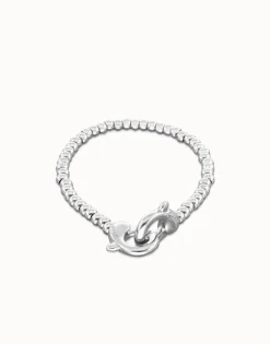 Pulsera de bolas pequeñas bañada en plata con mosquetón entrelazado
