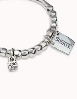 Pulsera de cuentas, pieza tubular y chapa con mensaje bañado en plata
