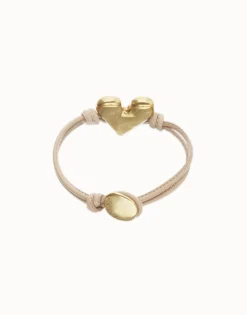 Pulsera de cuero camel con detalle de corazón bañado en oro 18k