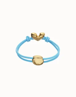 Pulsera de hilo elástico azul con corazón bañado en oro 18k