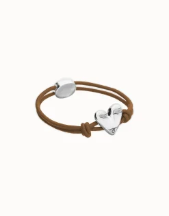Pulsera de hilo elástico marrón con corazón bañado en plata de ley