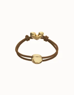 Pulsera de hilo elástico marrón con corazón bañado en oro 18k
