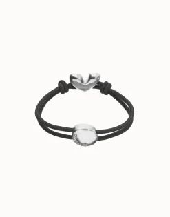 Pulsera de hilo elástico negro con corazón bañado en plata de ley