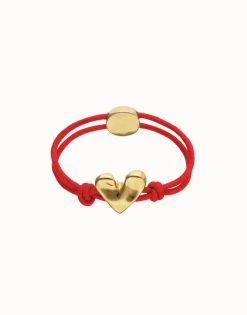 Pulsera de hilo elástico rojo con corazón bañado en oro 18k