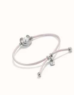 Pulsera de hilo lila con perla shell fornitura bañada en plata de ley.