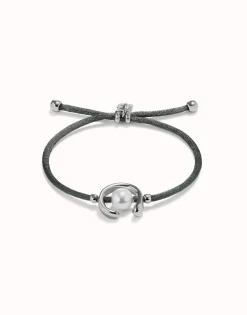 Pulsera de hilo negroso con perla shell fornitura bañada en plata de ley.
