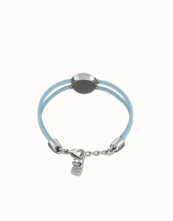 Pulsera doble de cuero celeste con ojo bañado en plata de ley