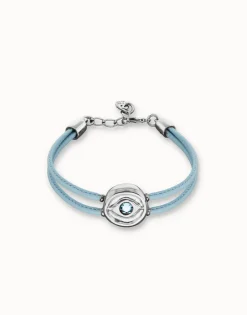 Pulsera doble de cuero celeste con ojo bañado en plata de ley
