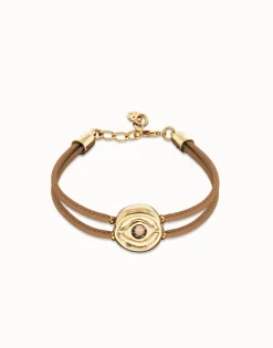 Pulsera doble de cuero crema con ojo bañado en oro 18k