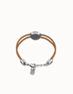 Pulsera doble de cuero crema con ojo bañado en plata de ley
