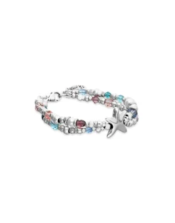 Pulsera elástica bañada en plata con cristales facetados y estrella de mar