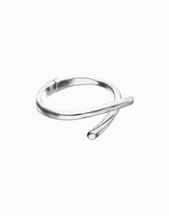 Pulsera rígida bañada en plata de ley con formas orgánicas entrelazadas